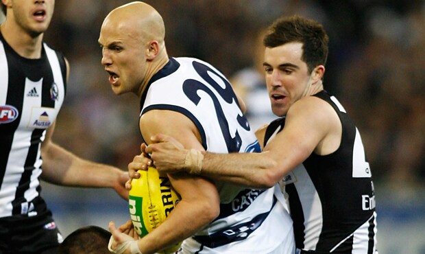 180613_sidebottom620.png Gary Ablett Junior is wrapped up by Steele Sidebottom during Collingwood's win over Geelong in round 19, 2010. - Collingwood,Collingwood Magpies